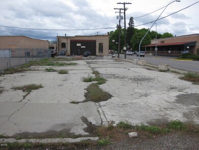 Old cracked concrete slabs are present