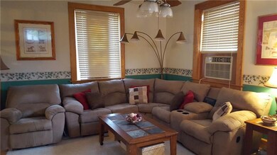 Here's one side of the living room with a gas corn