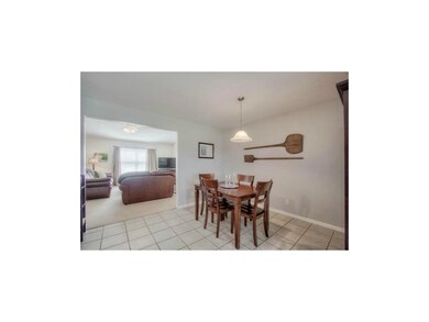 Dining space with tile flooring