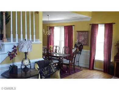 Living Room - Hardwood floors in Entry, Dining and
