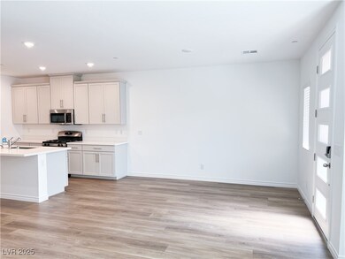Kitchen featuring appliances with stainless steel