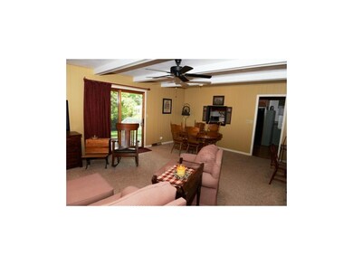 Dining area with pass-through to the kitchen.