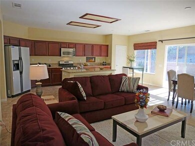 Very inviting great room, with modern kitchen.