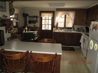 Sunny open kitchen with breakfast bar