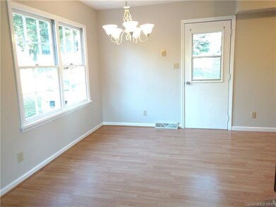 Dining Area open to Living Room, Bright & Sunny wi
