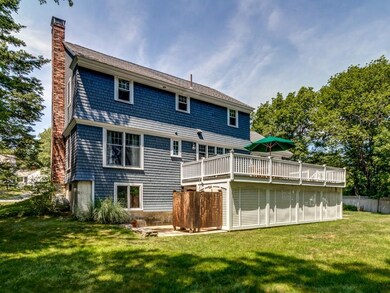 Side of home with outdoor shower.