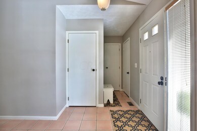 Basement door, coat closet