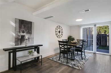 Dining space featuring wood finished floors