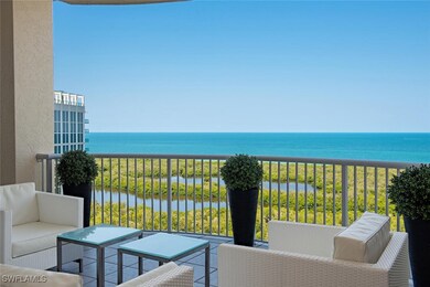 Balcony with a water view and an outdoor living sp