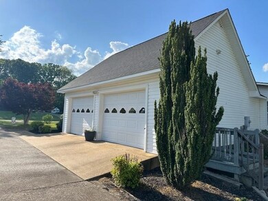 View of home's exterior with a garage