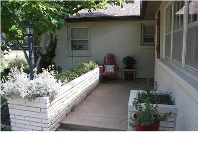 Great curb appeal with rustic window shutters, lan