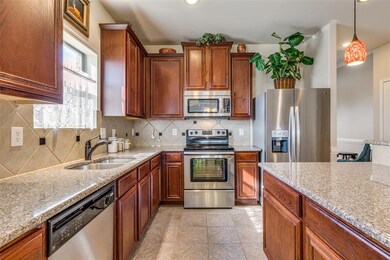 Gorgeous granite counters with stainless-steel dou