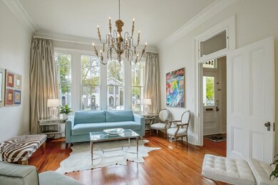 Living room with beautiful custom drapes (included