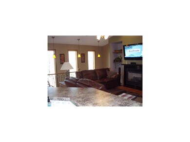 Living Room. OPEN LIVING ROOM, STAIRS TO LOWER LEV
