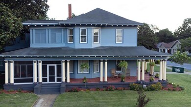 side view of home and screened porch