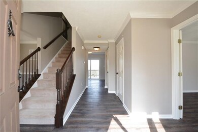 Clean, bright and neutral!  Entry houses powder ro