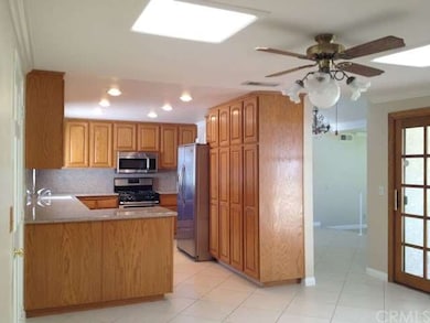 View from family room. Dining area and living room to the right; patio through French door.