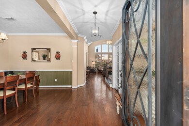 The custom front door shows the pride of ownership in this home at the first step.