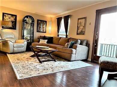 Light and bright - the living room boasts hardwood