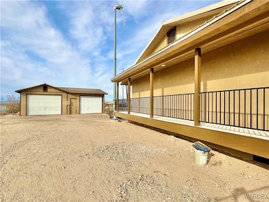 Home has a patio that goes around the entire upper level~