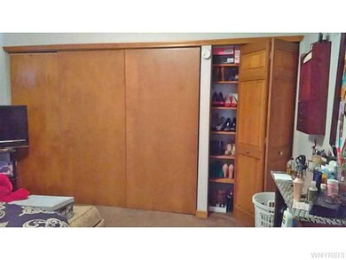 Bedroom. First floor bedroom with wall of closets