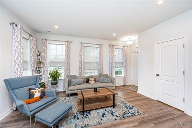 Living room with hardwood / wood-style floors