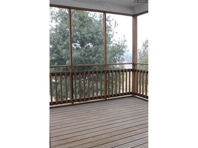 Sun Room Looking out over Private Backyard