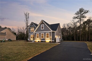 Craftsman inspired home with asphalt driveway, boa