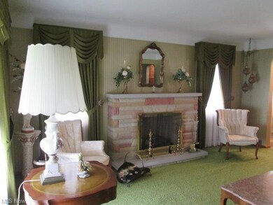 Living Room with decorative Fireplace