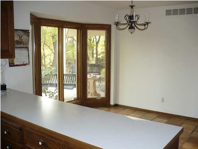 EATING SPACE IN KITCHEN WITH SPANISH TILES