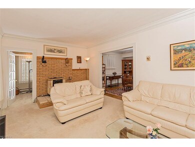 Living Room with Brick Veneer wall and hearth for 