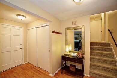Spacious entry with coat closet & hardwood floors!