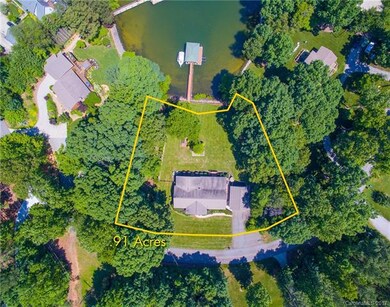 Large .91 Acre Lot offers privacy on the left and 