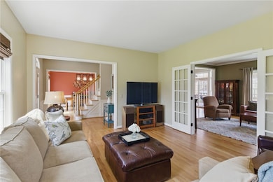 Living Room - hardwoods through out, flooded with