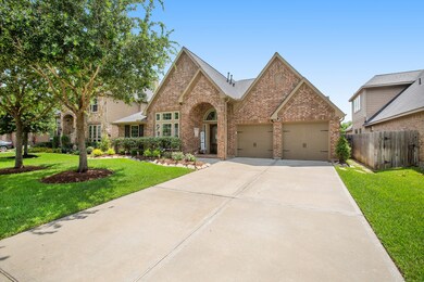 Beautiful Oak trees showing off the curb appeal of this home