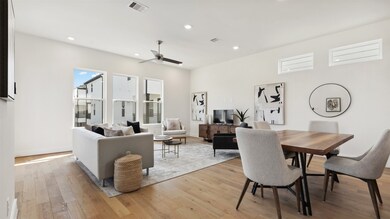 This photo showcases a bright, modern open-concept