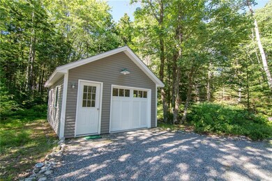 Separate one car garage and storage.