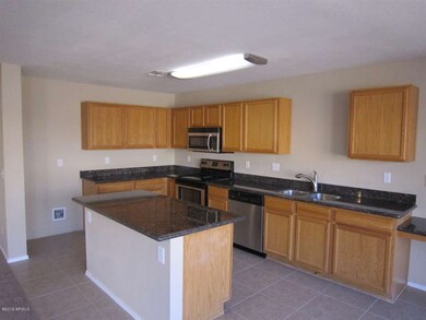 Kitchen with Granite and Stainless Steel