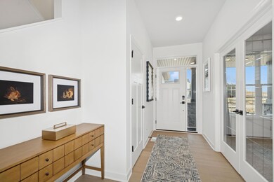 (Photo of a decorated model, actual homes finishes will vary) Make the best first impression with this bright and open foyer!