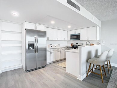 Clipper Cove unit 1411, Clearwater Beach, FL 33767 - photo 3
