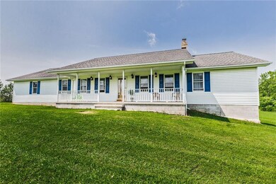 A country ranch  with open porch, sitting on 1.86 