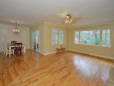 Dining Room open to Living Room with plenty of natural light