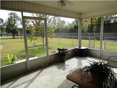 BACK HAS SCREENED PORCH FOR WATCHING THE BIRDS OR FOR COOLING OFF