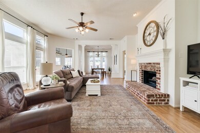 The house then opens up into the charming living room with adjoining dining room.