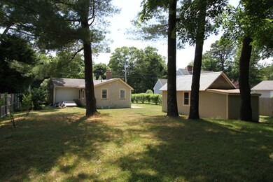 rear of house and garage from back yard