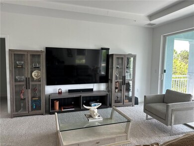 Living area featuring carpet flooring