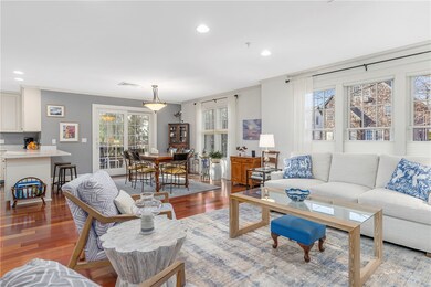 This sun-filled Living Room/Dining Area is 21' x 1