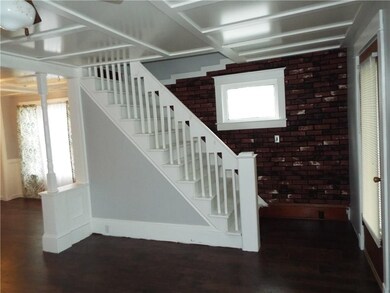 LIVING ROOM LOOKING AT STAIRWAY