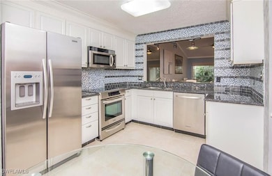 613 Squire Cir unit 202, Naples, FL 34104 - photo 6