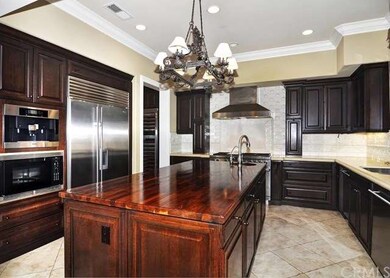 Beautiful kitchen with large center island and veg